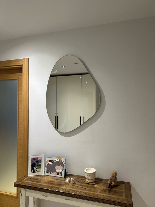 Frameless Asymmetric Mirror