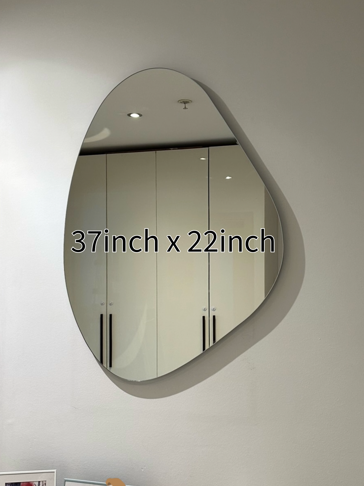 Frameless Asymmetric Mirror